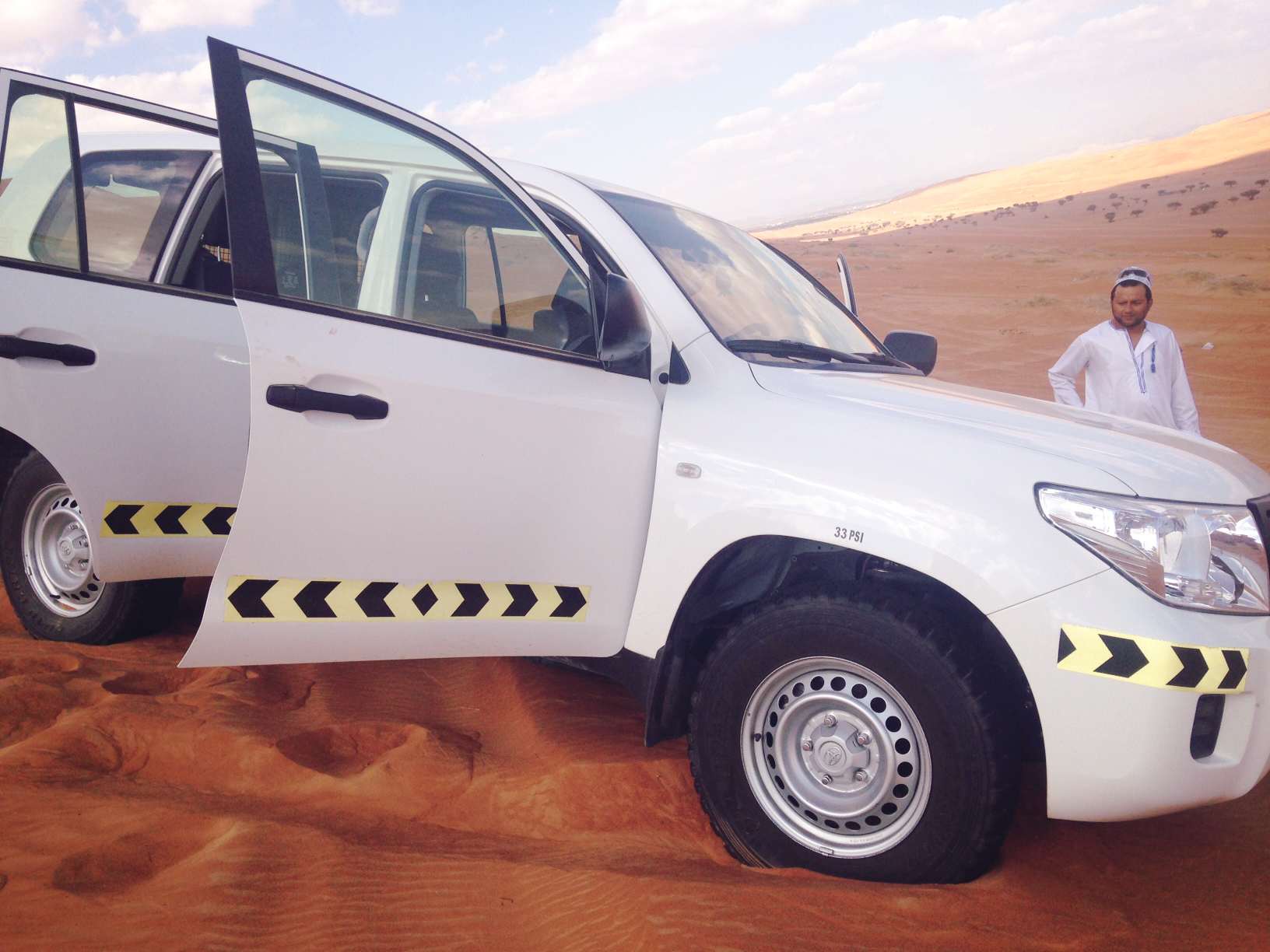 Faizal, driving through the desert