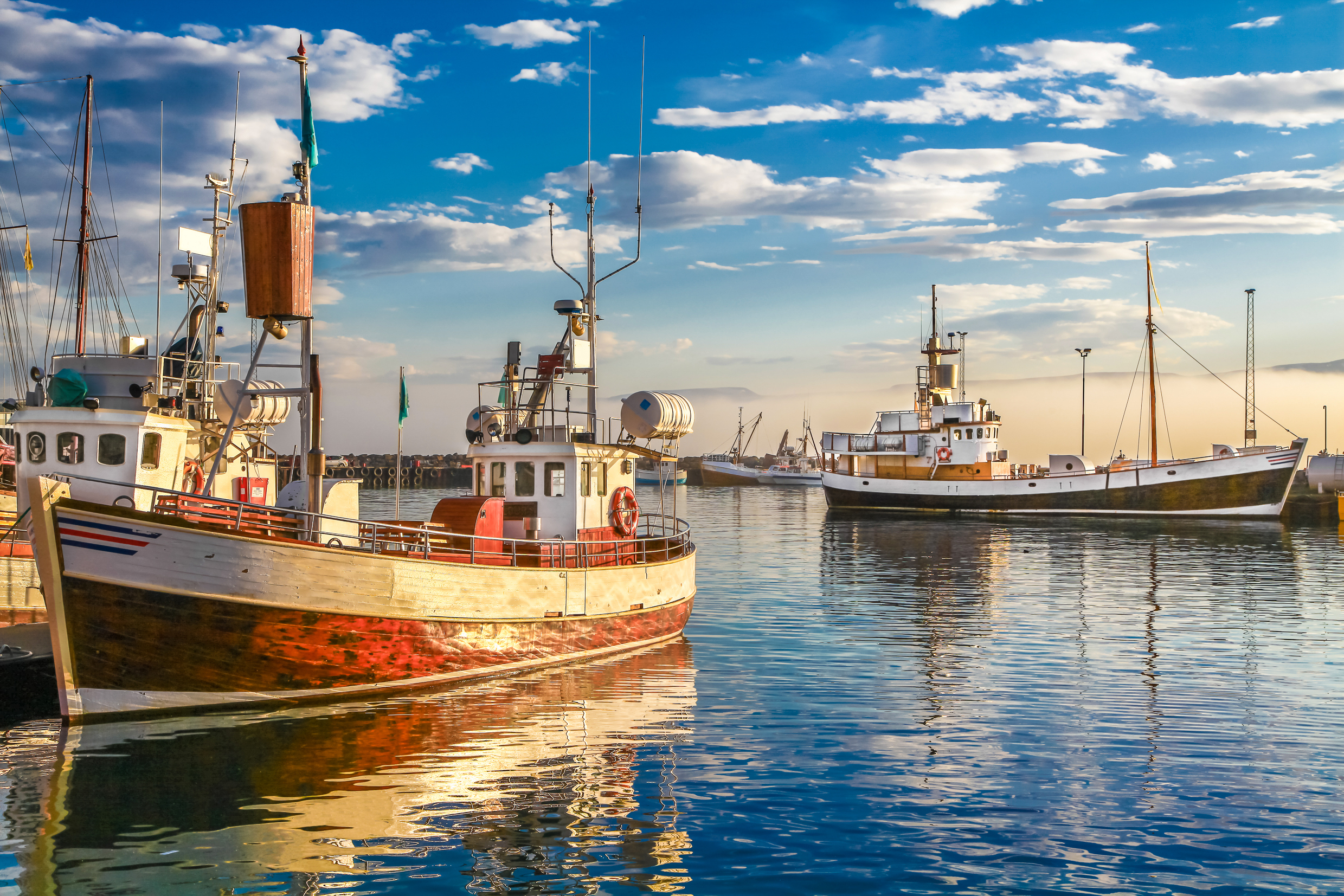 boats in town of Husavik-shutterstock